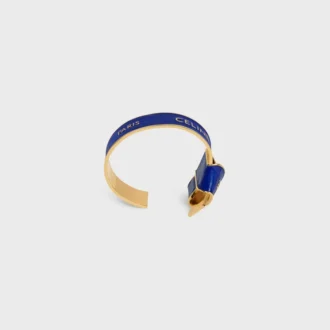 Celine Ribbon Knotted Cuff in Enamel and Brass with Gold Finish