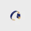 Celine Ribbon Knotted Cuff in Enamel and Brass with Gold Finish