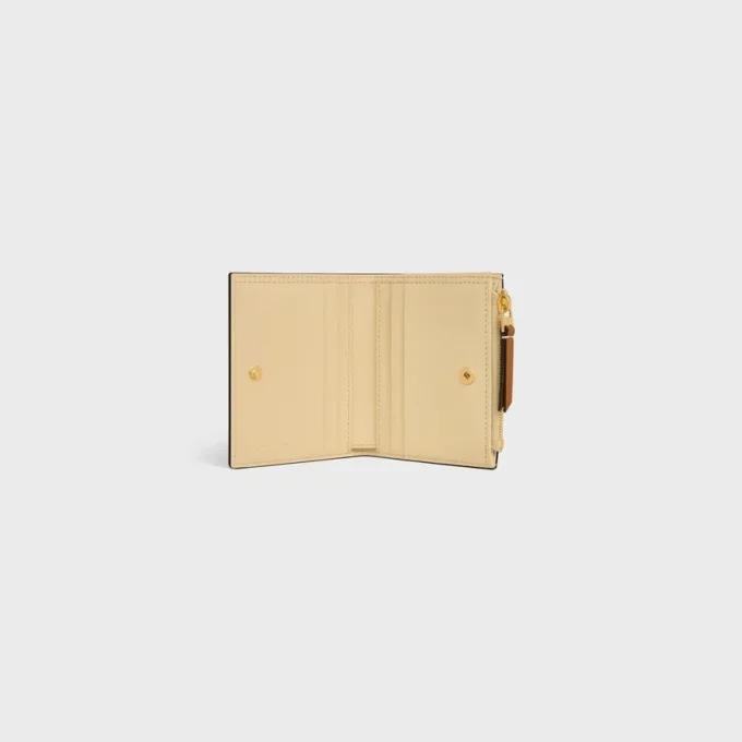 Compact Wallet Triomphe Stamp in Supple Grained Calfskin Compact Wallet Triomphe Stamp in Supple Grained Calfskin