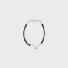 Knot Bracelet in Calfskin and Brass with Rhodium Finish Knot Bracelet in Calfskin and Brass with Rhodium Finish