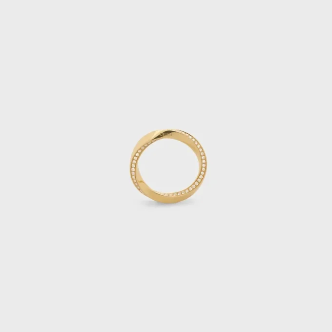 Torsion Ring in Yellow Gold and Diamonds Torsion Ring in Yellow Gold and Diamonds