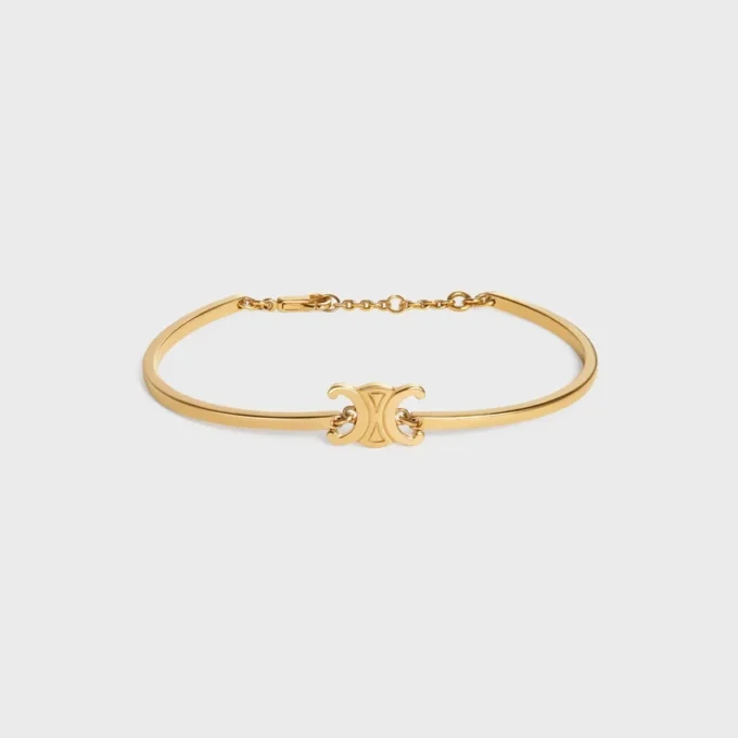 Triomphe Articulated Bracelet in Brass with Gold Finish Triomphe Articulated Bracelet in Brass with Gold Finish