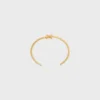 Triomphe Asymmetric Cuff in Brass with Gold Finish