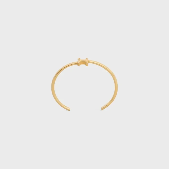 Triomphe Asymmetric Cuff in Brass with Gold Finish