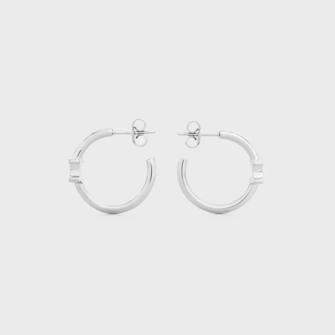 Triomphe Asymmetric Hoops in Brass with Rhodium Finish